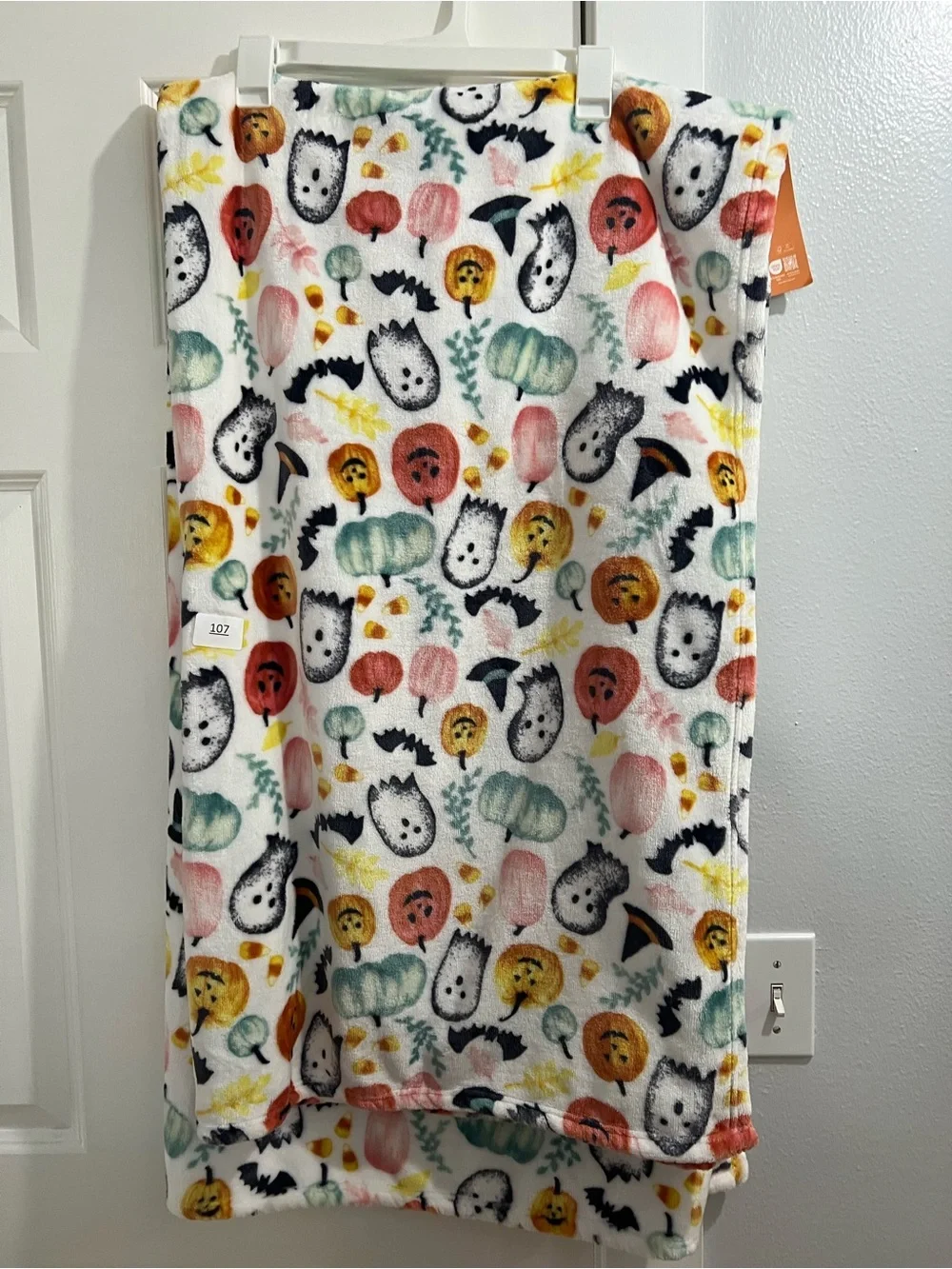 The Farmhouse Halloween Plush Throw Blanket in White Ghost & Pumpkin Print